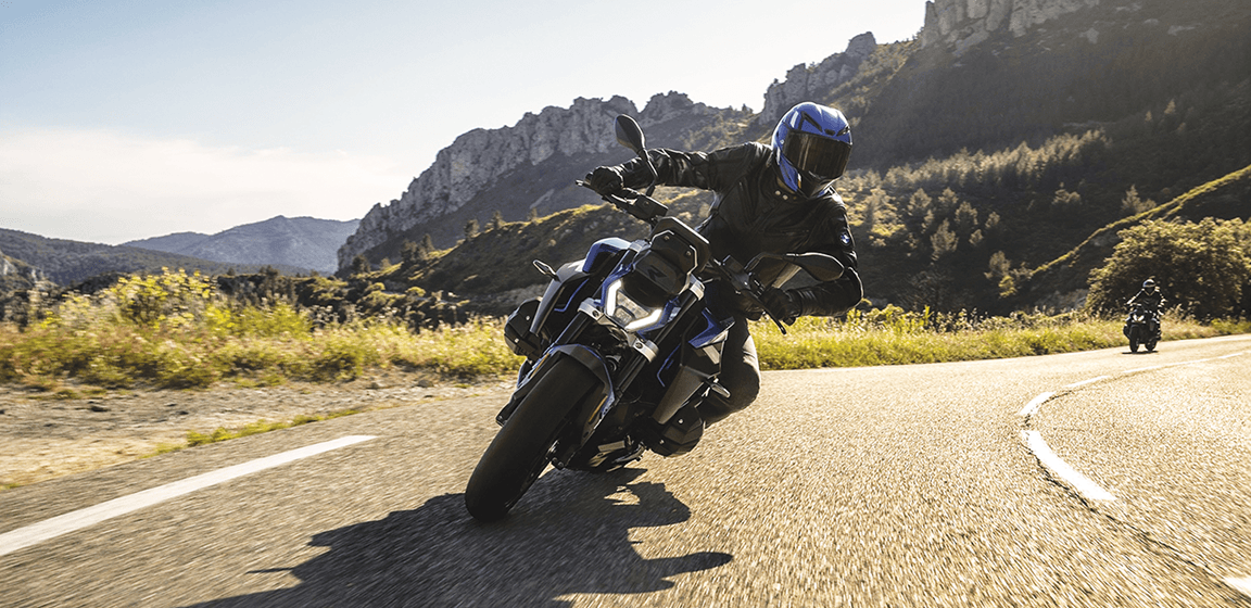 Custom motorcycle with sleek black design and golden accents, showcasing premium customization at Wheels & Wonders workshop